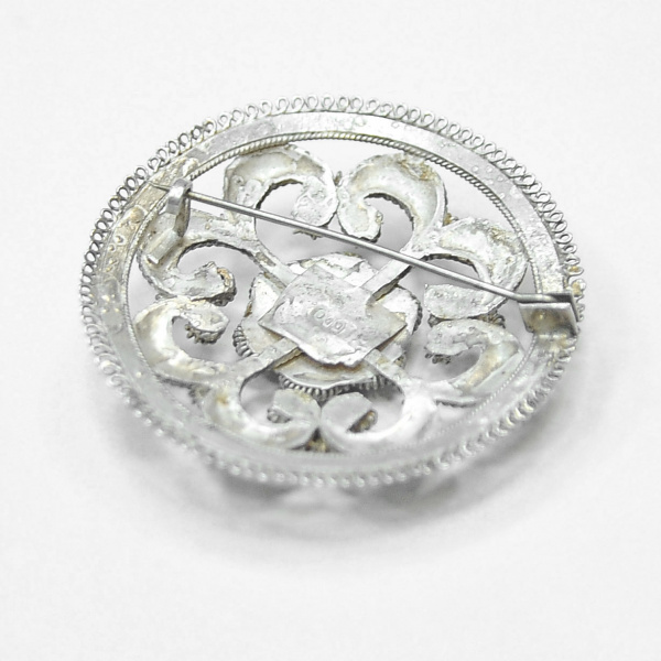 винтажная круглая серебряная брошь